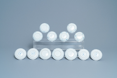 Twenty Chinese blue and white cups and twenty-four saucers, Kangxi