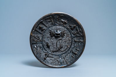 A Chinese lacquered bronze brush washer with sea animals, Xuande mark and dated 1428