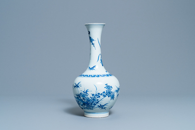 A rare Chinese blue and white bottle vase with a tiger and two butterflies, Transitional period