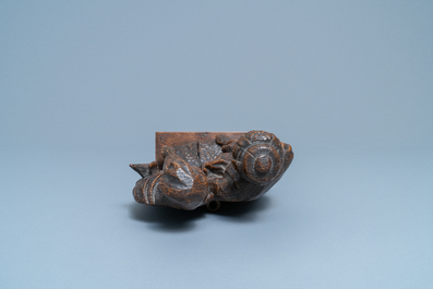 A Flemish carved oak group depicting two jews, probably Antwerp, 16th C.