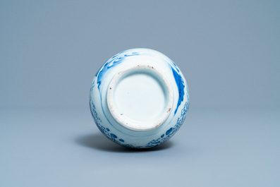 A Chinese blue and white double gourd vase with figures in a landscape, Transitional period