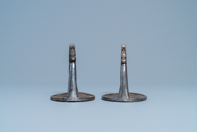 A pair of Tibetan iron stirrups with dragons, 17th C.
