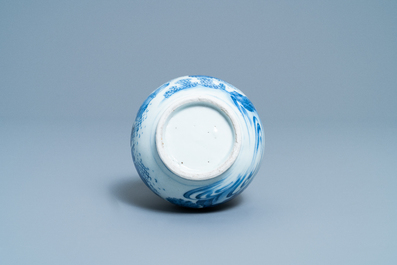 A Chinese blue and white double gourd vase with figures in a landscape, Transitional period