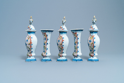A polychrome Dutch Delft five-piece garniture with chicken-shaped finials, 18th C.