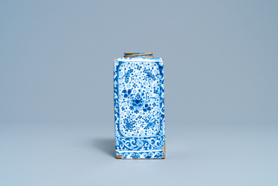 A rectangular Dutch Delft blue and white tea caddy with floral design, late 17th C.