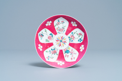 A Chinese famille rose ruby-ground cup and saucer, Yongzheng