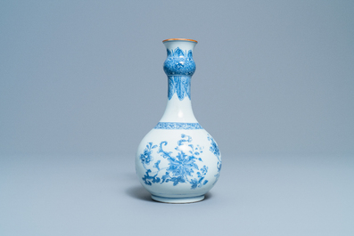 A Chinese blue and white bottle vase with floral design, Yongzheng/Qianlong