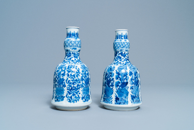 A pair of Chinese blue and white huqqa bases with floral design, Kangxi