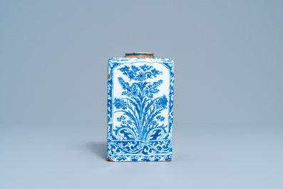 A rectangular Dutch Delft blue and white tea caddy with floral design, late 17th C.