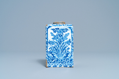 A rectangular Dutch Delft blue and white tea caddy with floral design, late 17th C.