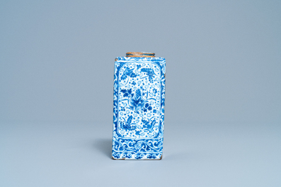 A rectangular Dutch Delft blue and white tea caddy with floral design, late 17th C.