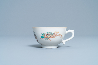 A Chinese famille rose Dutch market cup and saucer with the arms of Van Scholten en Wesele, Qianlong