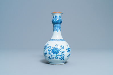 A Chinese blue and white bottle vase with floral design, Yongzheng/Qianlong