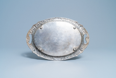 An oval silver tray with incised floral design, Thailand, 19/20th C.