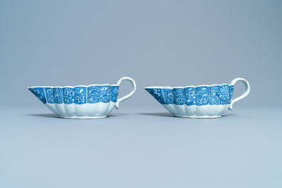 A pair of Chinese blue and white 'Romance of the Western Chamber' sauce boats on stand, Qianlong