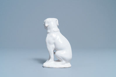 A white Dutch Delft model of a dog, 18th C.