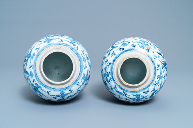 A pair of Chinese blue and white 'dragon and phoenix' jars, Yongzheng