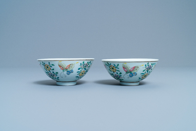 A pair of Chinese famille rose rice grain pattern 'butterfly' bowls, Qianlong mark, 18/19th C.