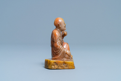 A Chinese Shoushan soapstone figure of a Luohan, signed Yu Xuan, 17/18th C.