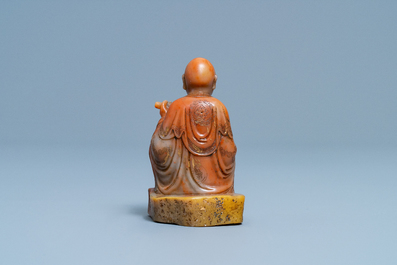 A Chinese Shoushan soapstone figure of a Luohan, signed Yu Xuan, 17/18th C.