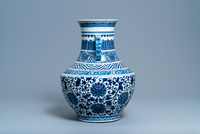 A Chinese blue and white 'hu' vase with lotus scrolls, 19th C.