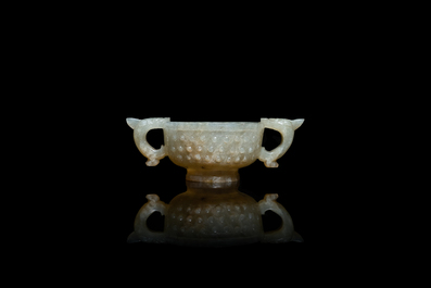 A Chinese celadon jade two-handled libation cup, Ming