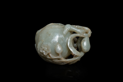 A Chinese mottled celadon and brown jade peach-form brush washer, Qing