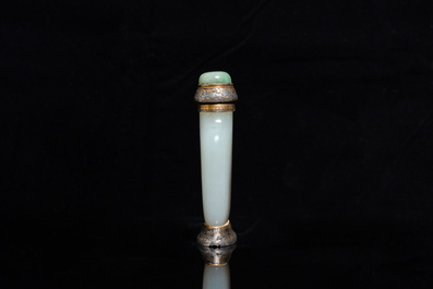 A Chinese white jade snuff bottle and two green jade carvings, 17th C. and later