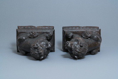 A pair of large Chinese cast iron models of lions, Ming mark and of the period