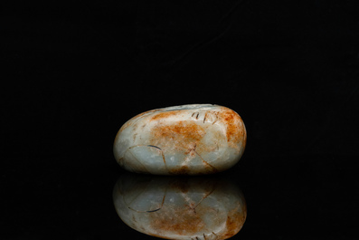 A Chinese celadon and russet jade boulder carving, Qing