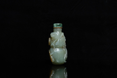 A Chinese gourd-shaped celadon and russet jade snuff bottle, Qing