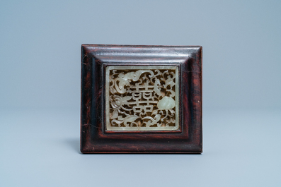 A Chinese reticulated celadon jade plaque, Qing