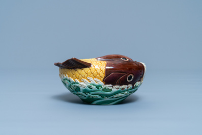 A Chinese carp-shaped sancai-glazed brush washer, Qianlong mark, 19th C.