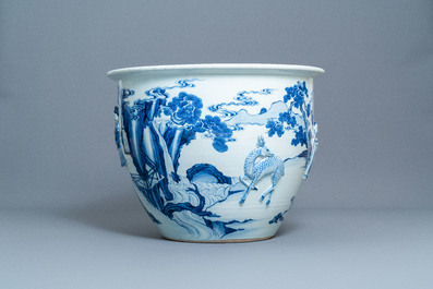 A rare large Chinese blue and white relief-moulded jardini&egrave;re, Kangxi