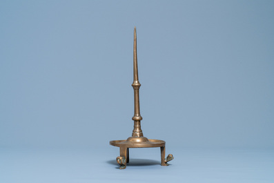 A Flemish or Dutch bronze candlestick, 14/15th C.