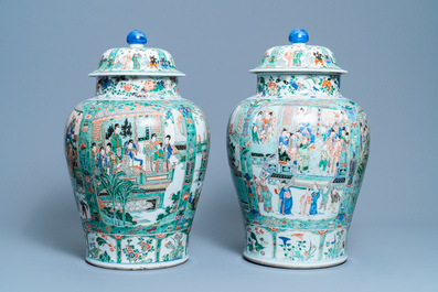 A pair of large Chinese famille verte vases and covers, Kangxi