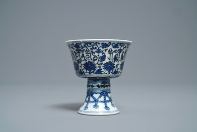 A Chinese inscribed blue and white stem cup, Qianlong seal mark and of the period