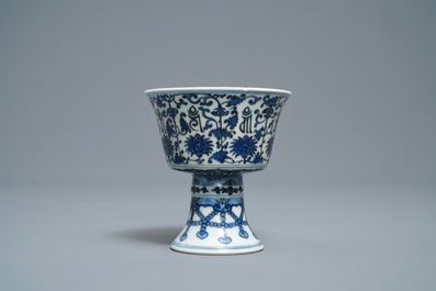 A Chinese inscribed blue and white stem cup, Qianlong seal mark and of the period