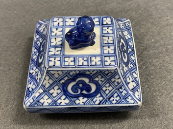 A pair of Chinese blue and white square vases and covers, Kangxi