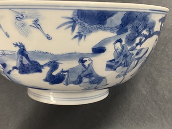 Un bol en porcelaine de Chine en bleu et blanc &agrave; d&eacute;cor de lettr&eacute;s et leurs servants, marque et &eacute;poque de Kangxi