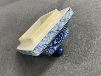 A pair of Chinese blue and white square vases and covers, Kangxi