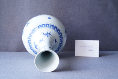 A rare Chinese blue and white bottle vase with a cat and a butterfly, Transitional period