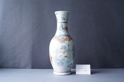 A Chinese famille rose vase with a tattoo scene from 'Jing Zhang Bao Guo', Qianlong mark, 19/20th C.