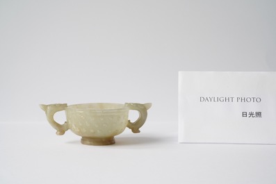 A Chinese celadon jade two-handled libation cup, Ming