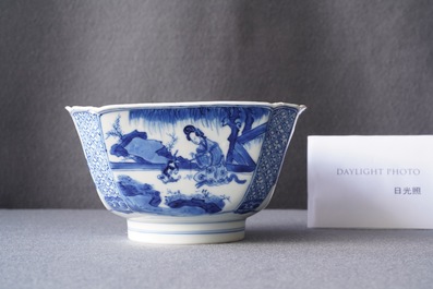 A Chinese blue and white bowl with a lady with cat, Kangxi mark and of the period