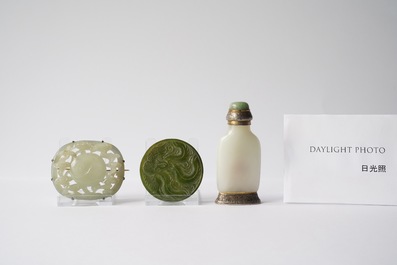 A Chinese white jade snuff bottle and two green jade carvings, 17th C. and later