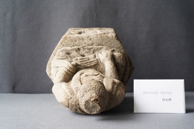 A Chinese carved stone group of Buddha on a throne, Wei or later