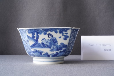 A Chinese blue and white bowl with a lady with cat, Kangxi mark and of the period