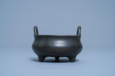 A Chinese bronze tripod censer, Xuande mark, 17/18th C.