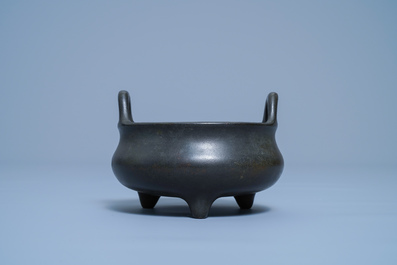 A Chinese bronze tripod censer, Xuande mark, 17/18th C.